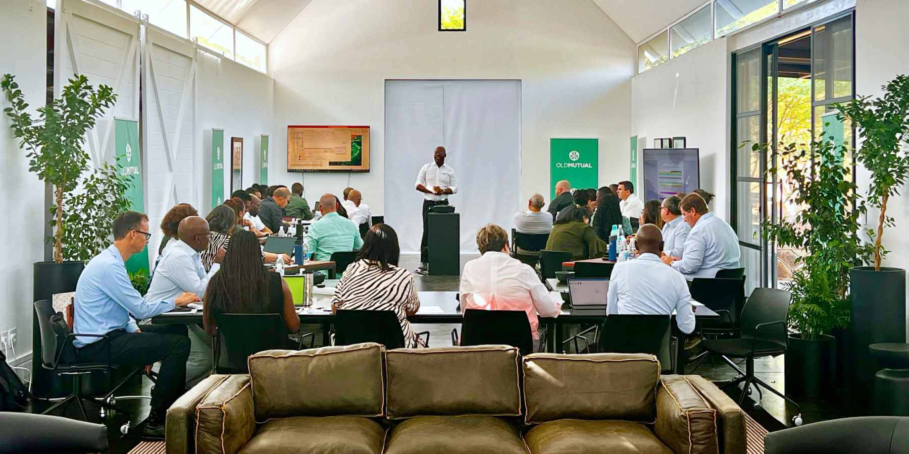A photograph of a corporate brainstorming event taking place at the Sandwerf conference facilities.